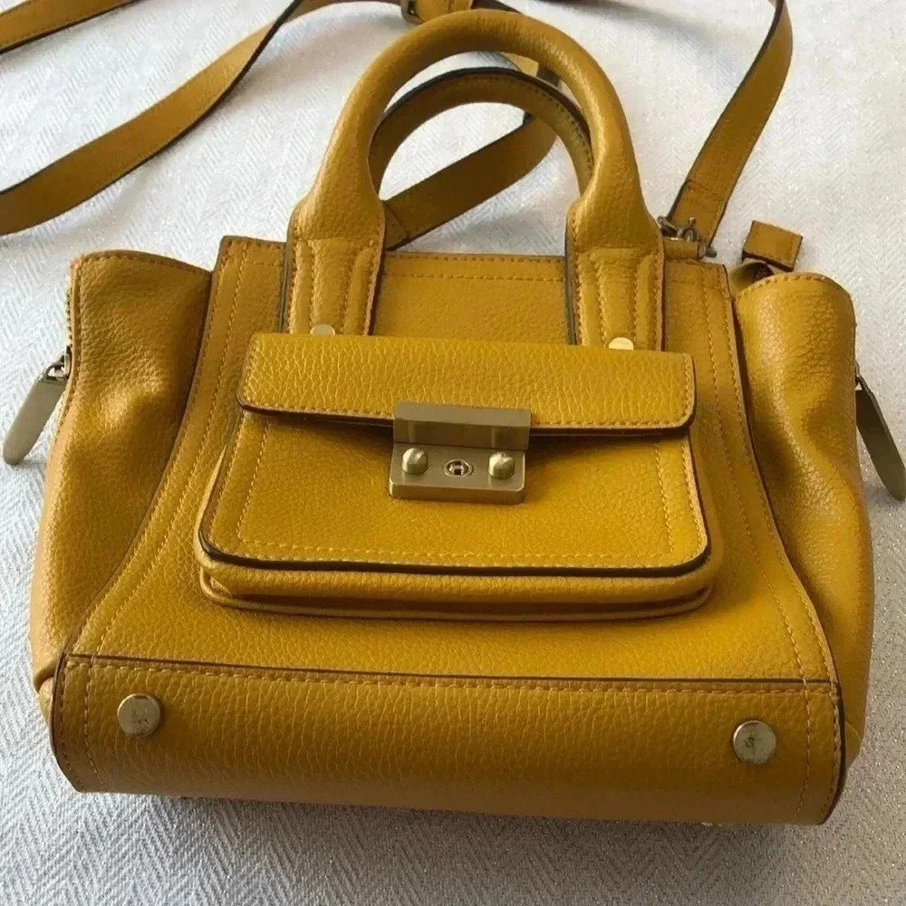 3-1 Philip Lim for Target yellow faux leather handbag with crossbody strap.